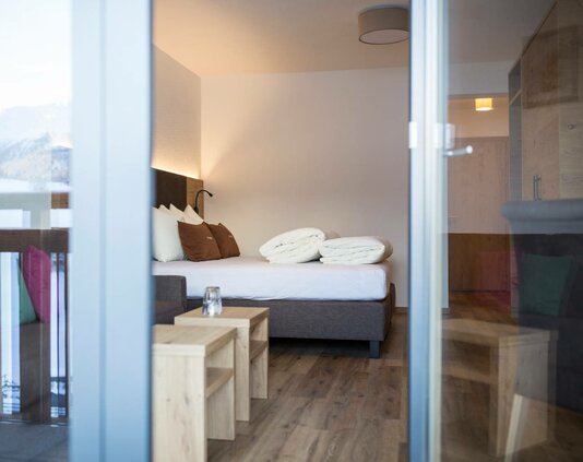 Gemütliche Zimmer & Suiten in Ladis, im Hotel mit Pool